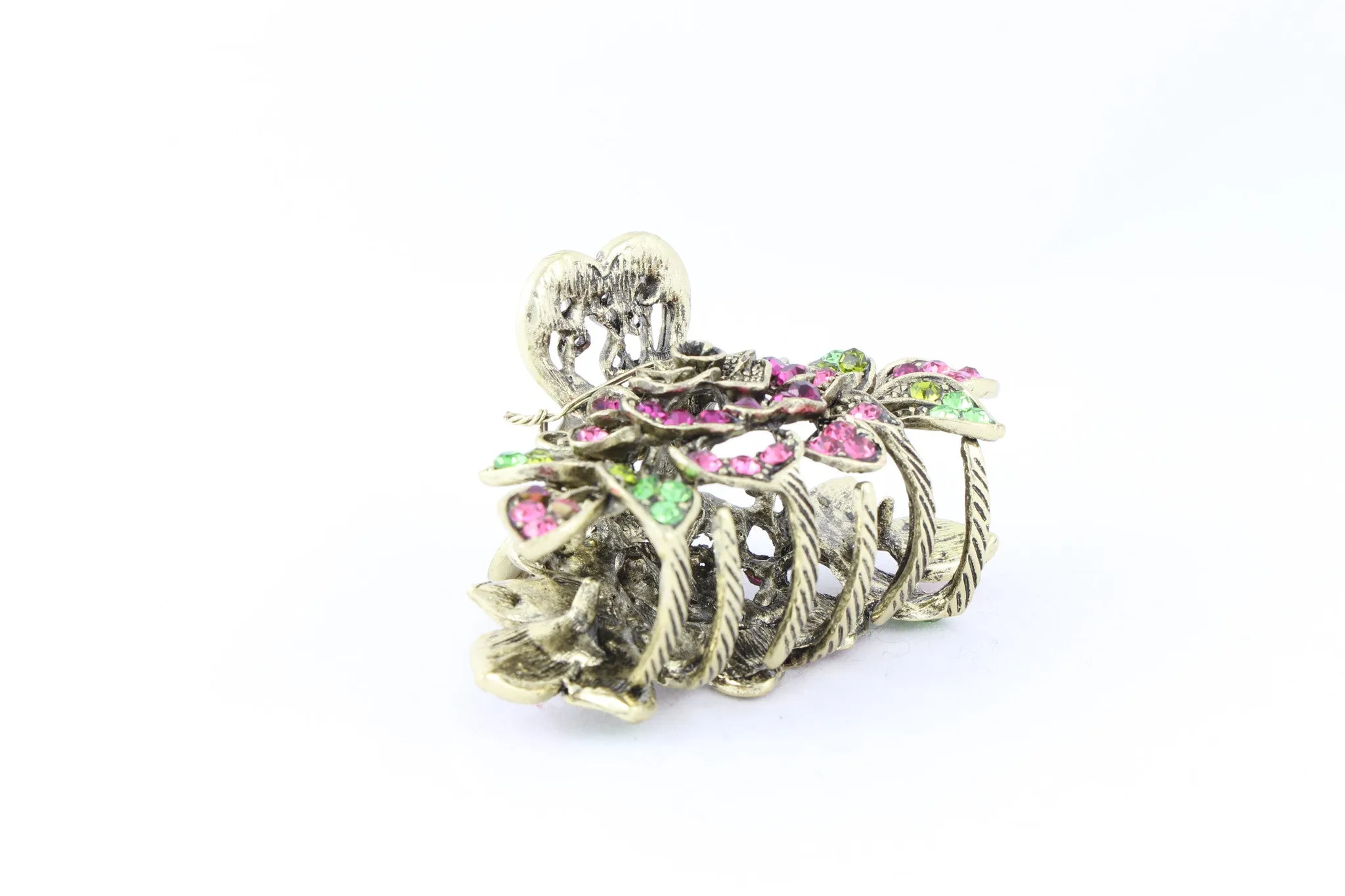 Antique bronze finish hair claw clip on a rose with pink stone petals