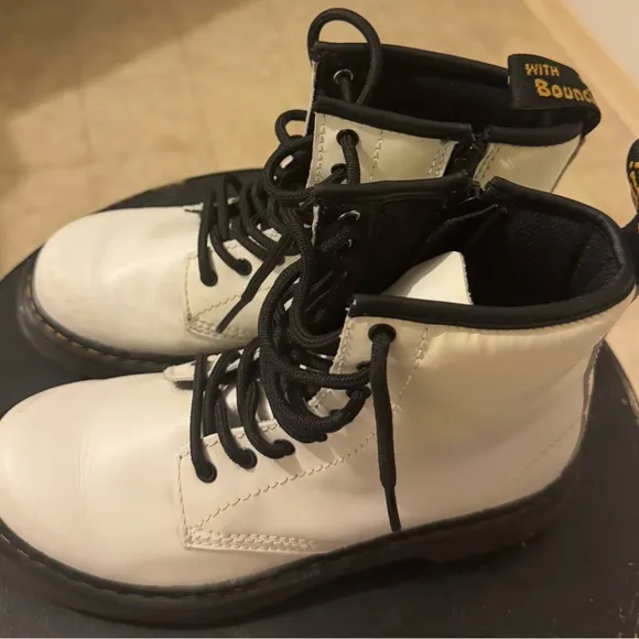 Great condition DR. Marten’s, white leather, lace up, with side zipper.
