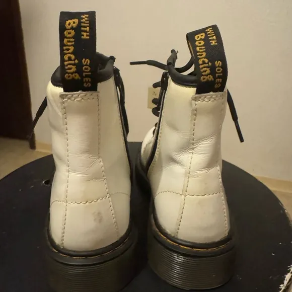 Great condition DR. Marten’s, white leather, lace up, with side zipper.