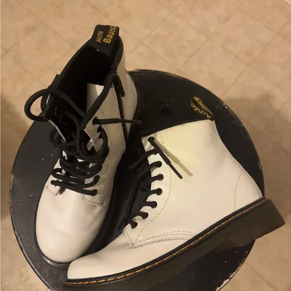 Great condition DR. Marten’s, white leather, lace up, with side zipper.