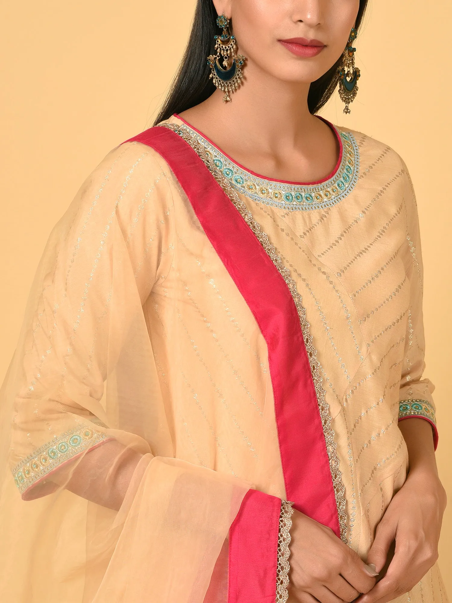 Light up in the Ecru Kurta Pant and Dupatta set